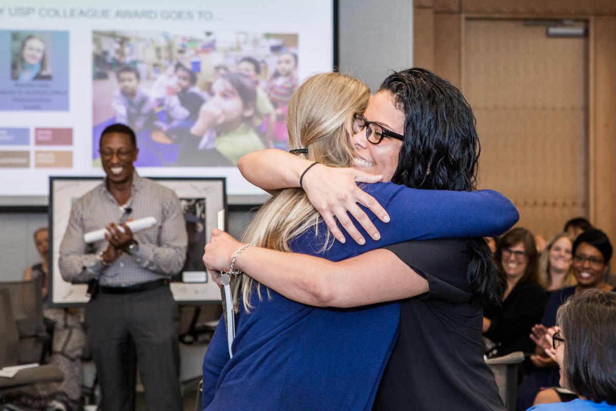 Natasha Fedo receives a Colleague Recognition Award at the U.S. Program All Staff Meeting during 2019 Annual Employee Week in Seattle, WA on May 15, 2019. 
