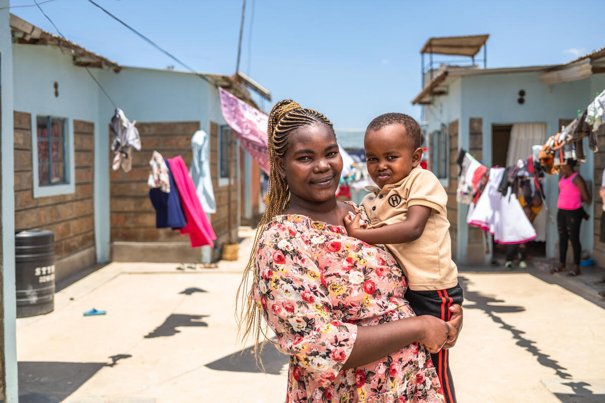 Christine and her son at their home in Wote, Makueni County, Kenya, on March 14, 2025. Makueni County has implemented E-MOTIVE (Early Detection and Treatment of Postpartum Hemorrhage), which is focused on reducing maternal deaths from postpartum hemorrhage (PPH), a major cause of maternal mortality.