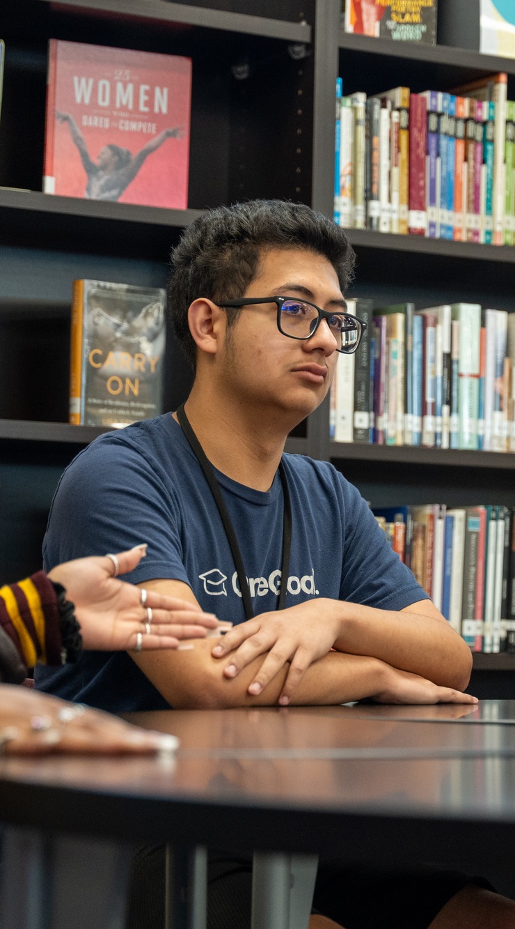 A Gates Foundation employee meets with students in Houston, Texas.
