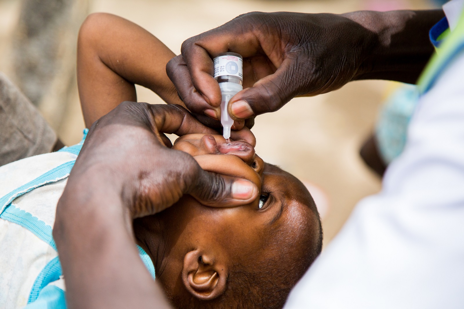 Seven-month-old Tamaiariss is given a polio vaccine during a door to door vaccine campaign in the Zaikai district in Maroua, Cameroon.