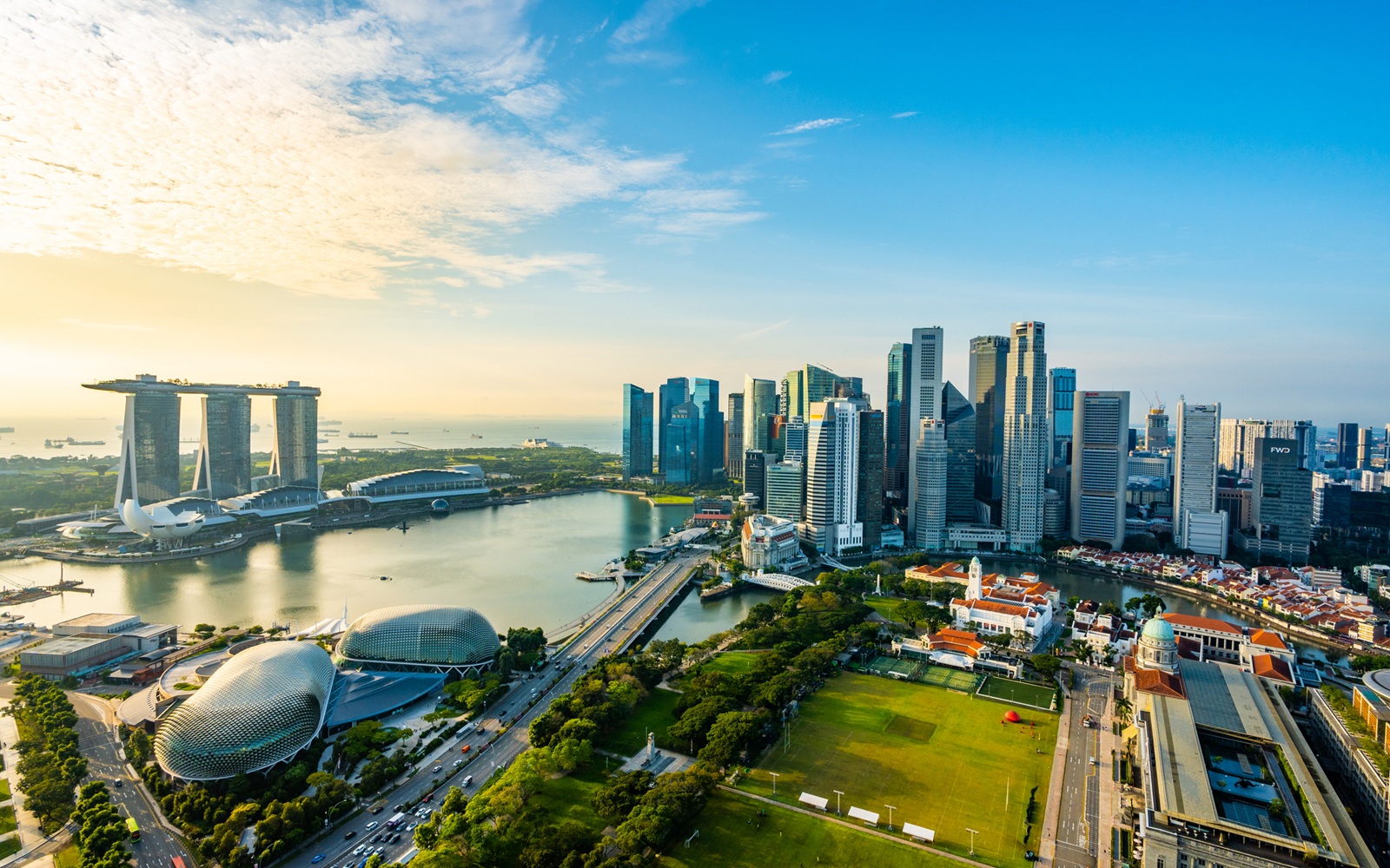 Aerial View of the Singapore City Skyline and Marina Bay at Sunrise