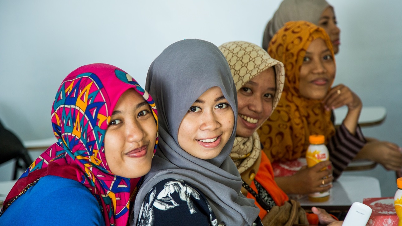 Graduates of a midwifery school attend a contraception seminar in Makassar, Indonesia.