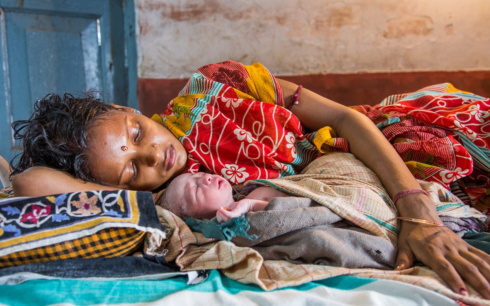 A mother and newborn at a health center in the Patna district of Bihar, India. " (Default Alternate Text: "A mother and newborn at a health center in the Patna district of Bihar, India.