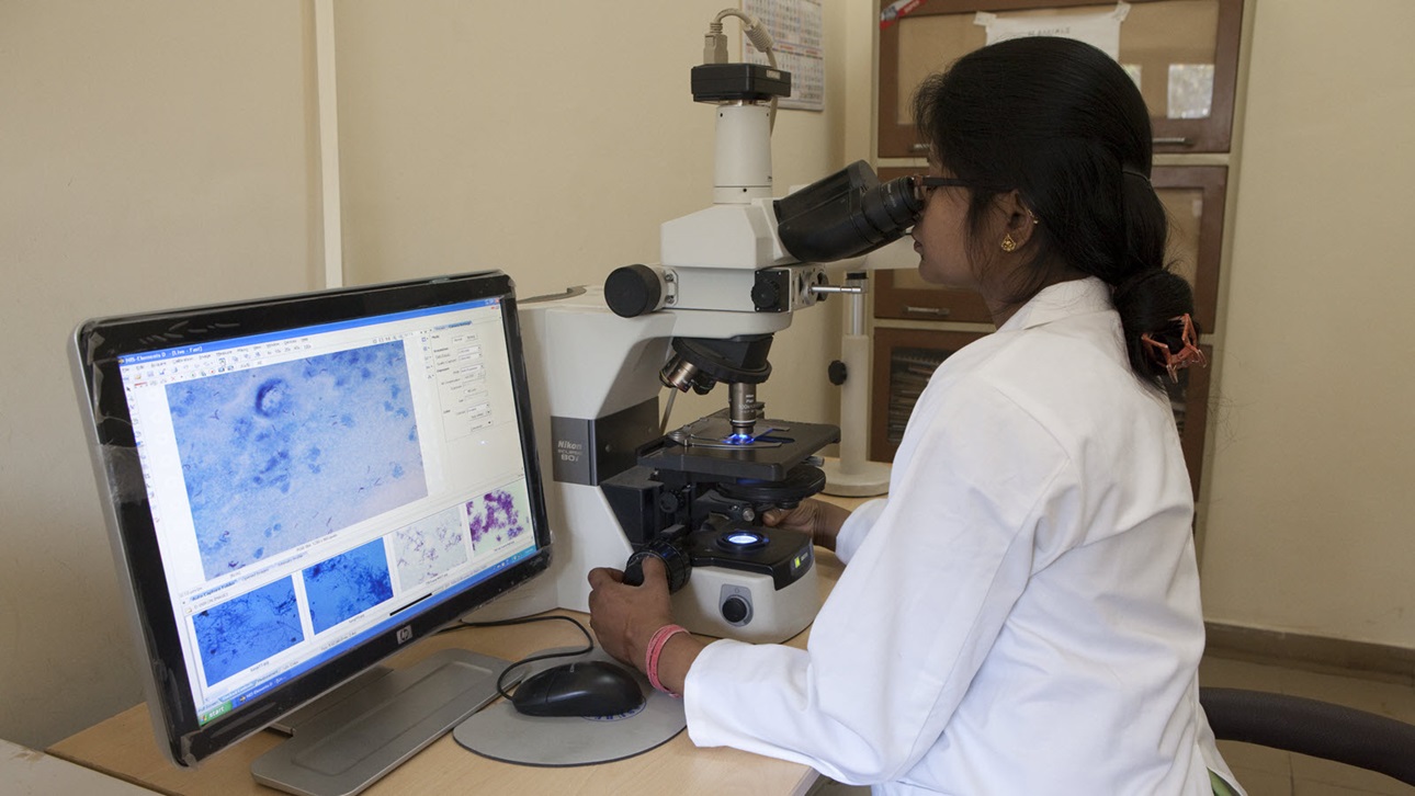 A researcher in the microscopy room at the Lala Ram Swarup Institute of Tuberculosis and Respiratory Diseases in New Delhi, India. 