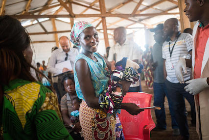 Mother with infant in DRC camp