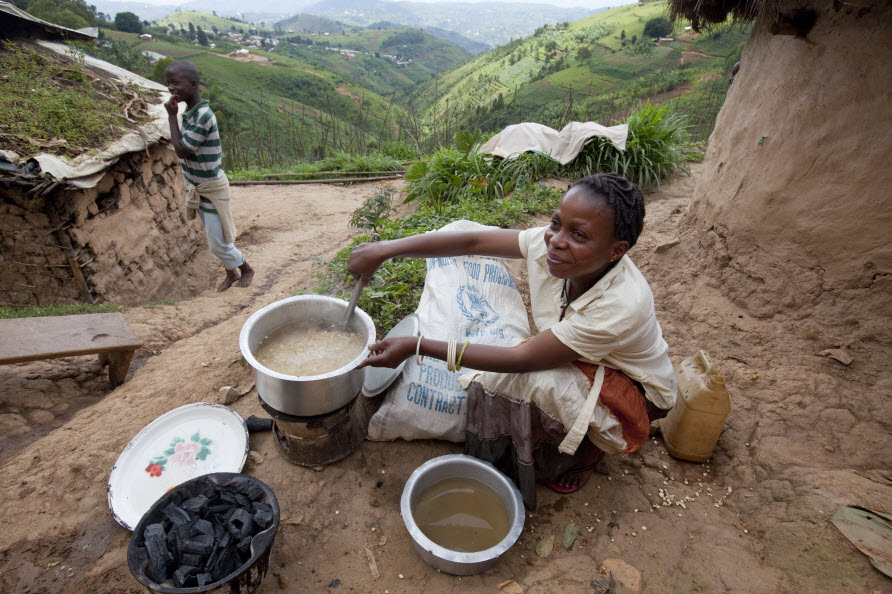 Foreign aid helps refugees like Nikuze Aziza feed their families and stay healthy (Kiziba Camp, Rwanda, 2011).