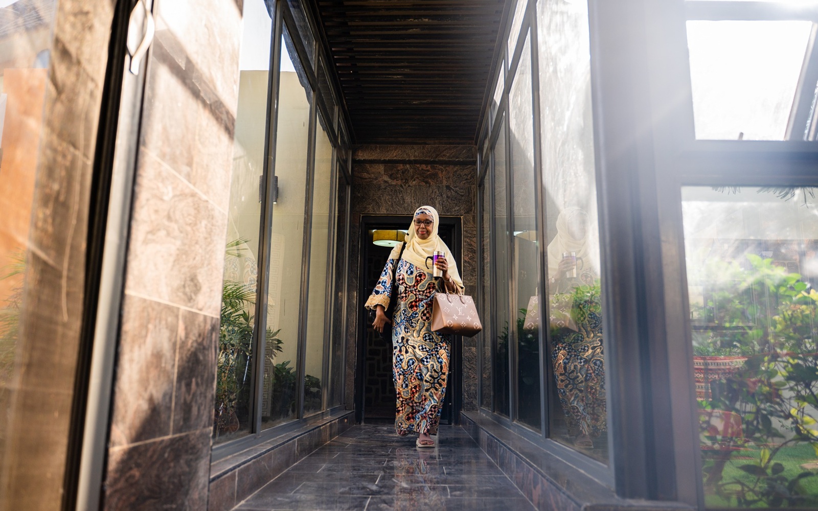 Prof. Dr. Hadiza Shehu Galadanci exits her home before setting off for work at the African Center of Excellence for Population Health and Policy (ACEPHAP), Aminu Kano Teaching Hospital, in Kano, Kano State, Nigeria on January 19, 2026.