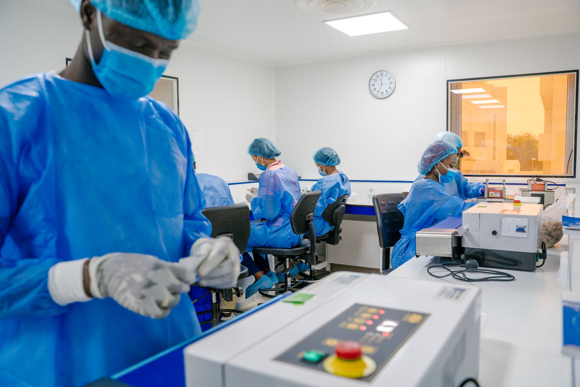Scientists work on COVID-19 tests in the Diatropix Lab at Institut Pasteur in Dakar, Senegal, on June 22, 2022.