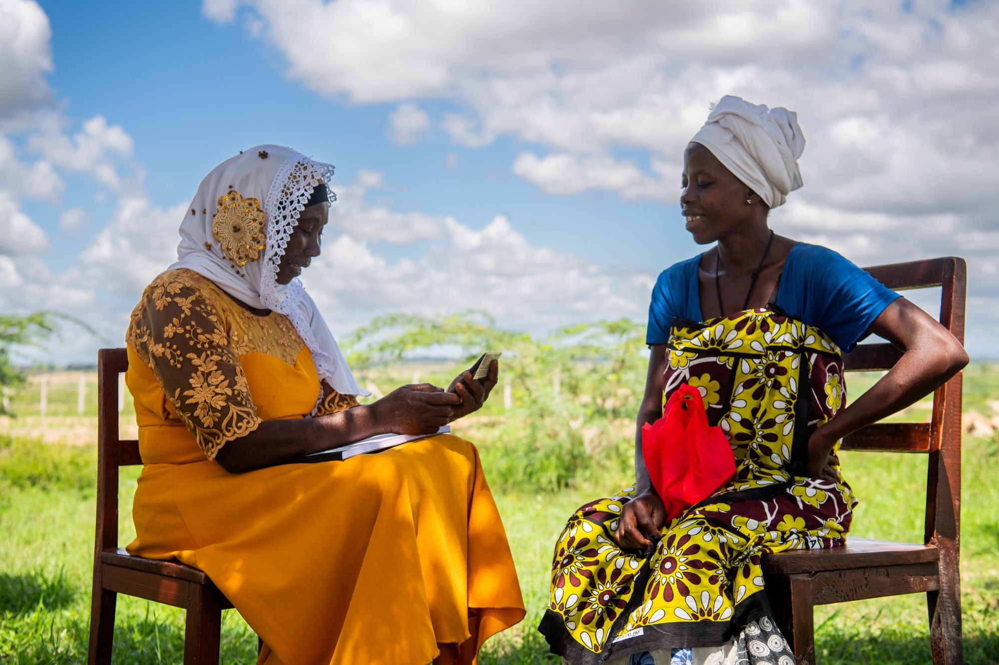 Community health volunteer, Mesaid Mwarudu, conducts interview with expectant mother, Chizi Wabungo in Mariakani, Kenya on May 16, 2023.