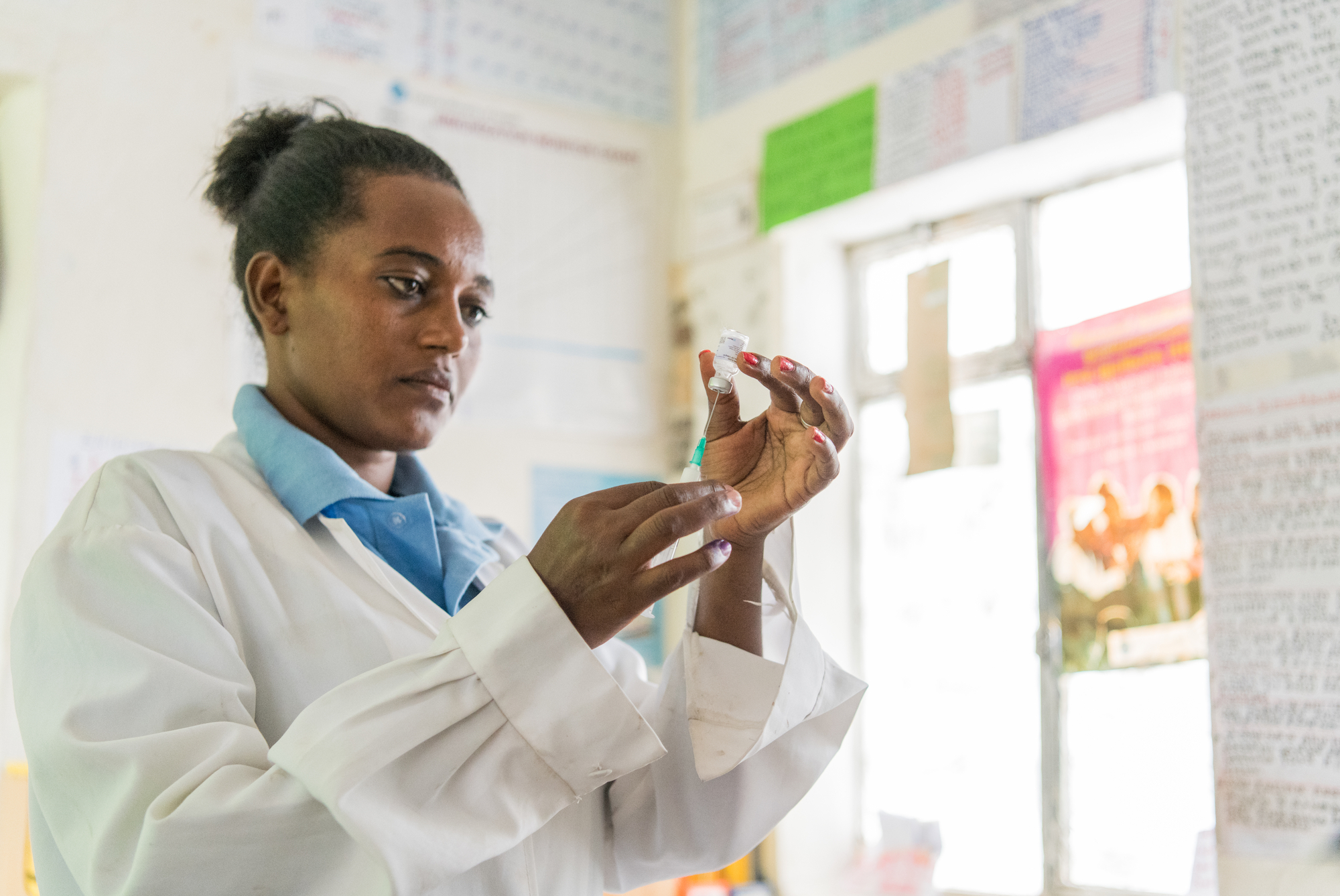 Beimnet Endashaw, (25), a health extension worker, prepares a contraceptive injection at the Shera Dibandiba health post center near Mojo town, Ethiopia on September 2, 2019.