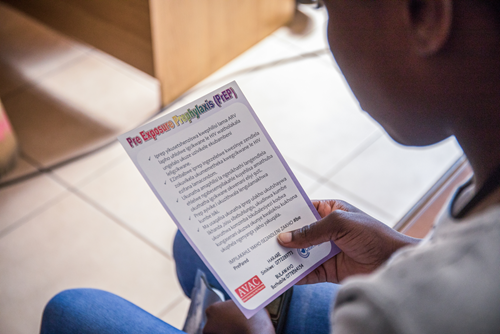 A client reads through a flyer about Pre-exposure prophylaxis (PrEP) at the Sisters with a Voice (SWV) clinic in Bulawayo on July 3, 2018.