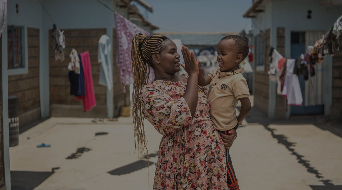 Christine and her son at their home in Wote, Makueni County, Kenya. Makueni County has implemented E-MOTIVE (Early Detection and Treatment of Postpartum Hemorrhage), which is focused on reducing maternal deaths from postpartum hemorrhage (PPH), a major cause of maternal mortality.