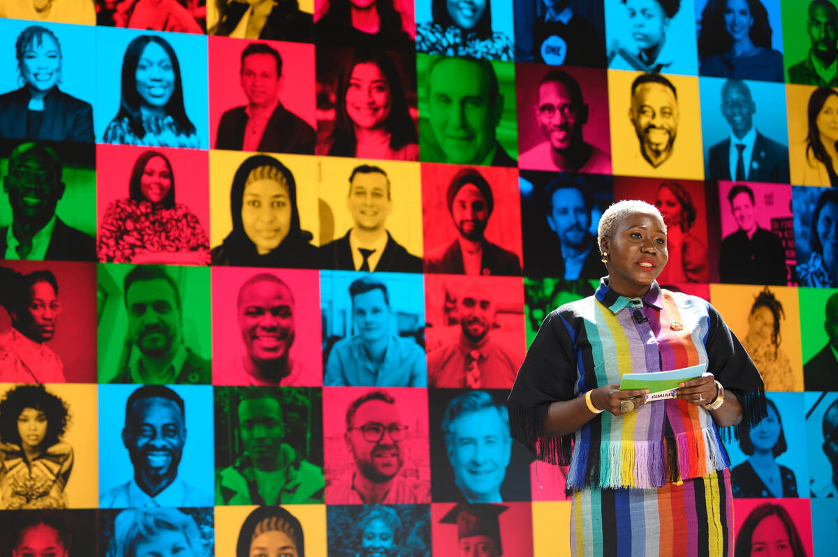Blessing Omakwu speaks onstage at Goalkeepers 2022. ©Gates Archive/Mike Lawrence
