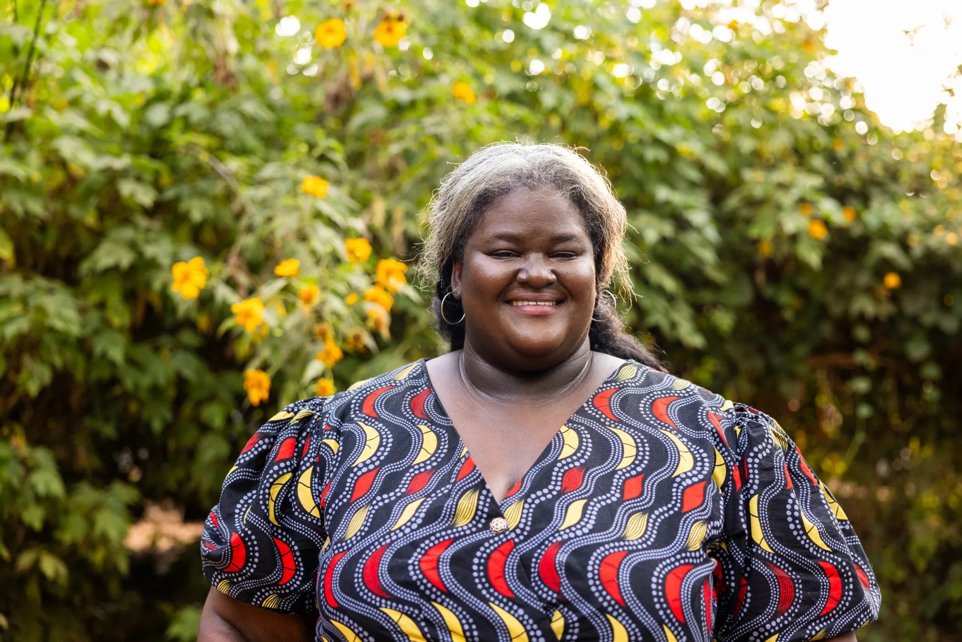 Krystal Mwesiga Birungi, an entomologist with Target Malaria Uganda, poses for a portrait in Entebbe, Uganda.